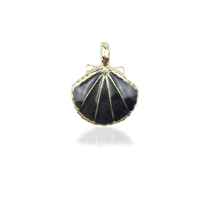 Detail of shell-shaped pendant with golden metal edges and black enamel finish