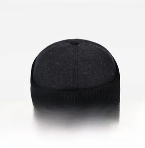 Rear view of a black wool miki hat showing minimalist texture and ribbed edge