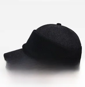 Side view of winter baseball cap with ear flaps showing thick knitted texture and black fabric