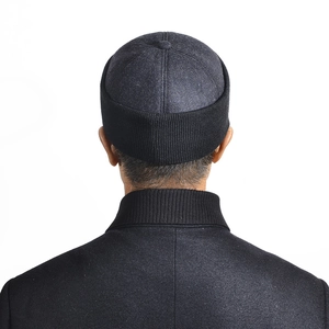 Men's winter grey wool patchwork miki hat with black ribbed trim for warmth