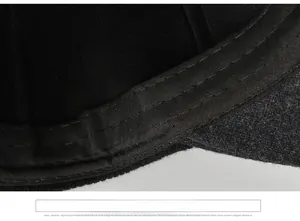 Detail of internal sweatband with reinforced stitching on men's winter warm peak cap