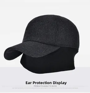 Detail view of winter baseball cap showing integrated ear flaps and neck protection