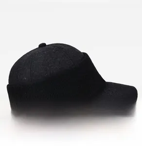 Side view of men's winter knit baseball cap with ear flaps in dark grey warm fabric