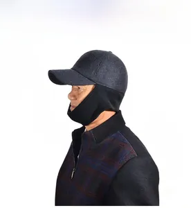 Detailed side view of winter peak cap with knitted ear and neck protection for men