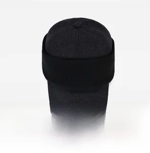 Top view of men's winter baseball cap showing textured black wool and knit ribbing