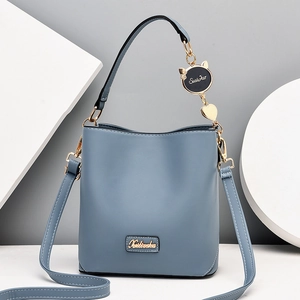 Chic Morandi blue leather bucket bag with top handle and adjustable shoulder strap