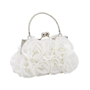 Detail of handcrafted 3D satin roses on ivory evening bag with silver metal handle