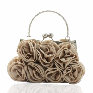 Elegant champagne satin evening clutch featuring 14 handmade 3D roses and silver metal handle