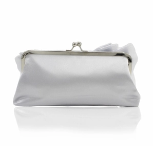 Detailed view of silver satin evening bag featuring a metal kiss lock and pleated fabric