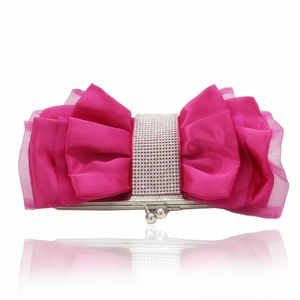 Detail of rose red satin evening bag featuring a pleated bow and rhinestone buckle clasp