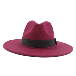 Classic wine red wool felt fedora hat with black ribbon band on white background