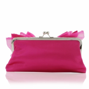 Detail of pink satin evening clutch featuring silver metal frame and ruffled top detail