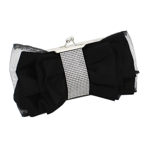 Detail of black silk bow evening bag with sparkling rhinestones and mesh texture