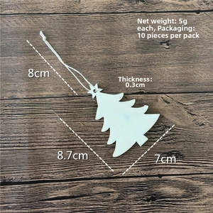 Detailed view of white Christmas tree wooden pendant with product dimensions and weight