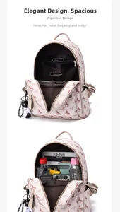 Detailed interior of pink backpack showing large capacity and multi-pocket organization