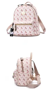 Detail of beige faux leather backpack with horse print and cute bear charm pendant