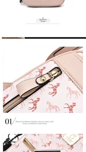 Detail of soft leather handbag with textured horse print and golden metal zipper
