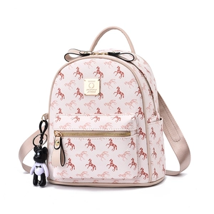 Chic cream mini backpack with horse patterns and a cute bear charm for women