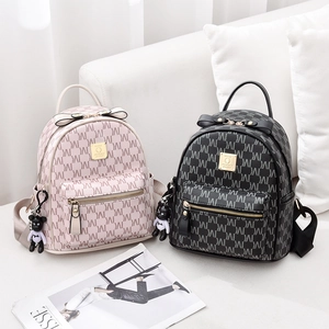 Mini sacs à dos chic en similicuir à monogramme rose et noir avec breloques d'oursons