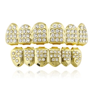Close-up of 18K gold plated hip hop grillz set with shiny cubic zirconia stones