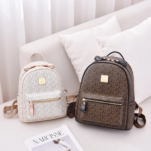 Large capacity monogram backpack in cream and brown faux leather for casual travel