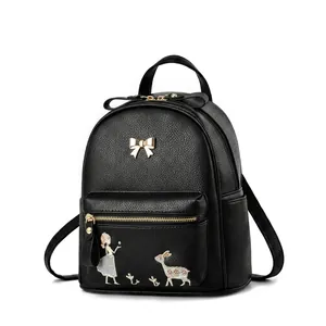 Tableau des tailles détaillé d'un sac à dos en similicuir noir avec broderie et dorures