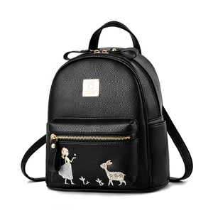 Sac à dos minimaliste en cuir noir avec broderie élégante et détails dorés brillants