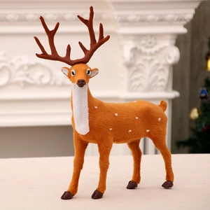 Realistic standing reindeer Christmas decoration with warm brown fur and white spots