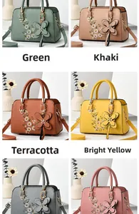 Detailed view of large-capacity embroidered handbag collection in six various colors