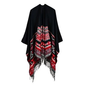 Women's reversible knit poncho with horizontal stripes and tassels on white background