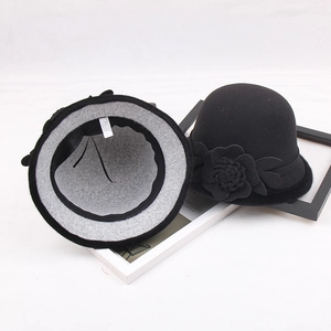Detail view showing black wool fedora interior lining and fabric material tag