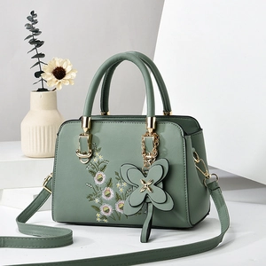 Morandi green PU leather shoulder bag with floral embroidery and bow pendant decoration