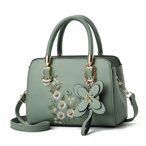 Elegant bean green tote bag with floral embroidery and gold hardware handles