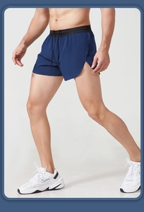Close-up of men's blue athletic shorts showing breathable mesh texture and drawstring waist
