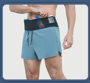 Close-up of athletic shorts featuring a high-waisted storage belt with hidden pockets