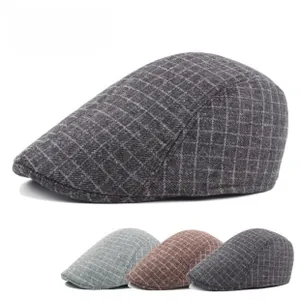 Detailed comparison of wool blend flat caps in various colors with classic windowpane pattern