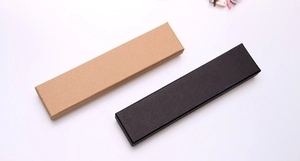 Top view of rectangular kraft and black cardboard jewelry boxes for necklaces