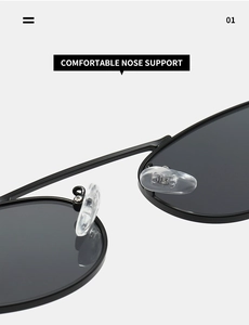 Detailed close-up of comfortable silicone nose pads on black metal cat-eye sunglasses