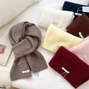 Soft wool knit scarf for women available in multiple solid colors for winter warmth