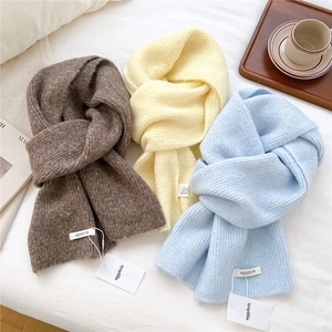 Solid color wool blend rib knit scarves in brown, yellow and blue for winter warmth