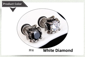 Detailed close-up of gothic cross earrings with black and white zircon stone settings