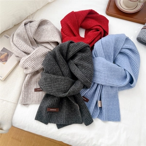 Thick ribbed knit scarf for women in four colors with luxury leather brand label