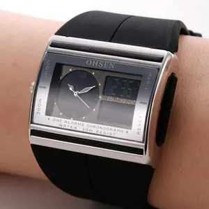 Rugged dual-display sports watch with silver metal case and black silicone strap on wrist