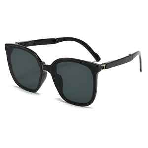Folding black oversized frame sunglasses with UV protection for outdoor portability