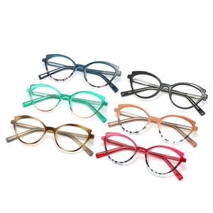 Detailed macro view of trendy TR90 cat-eye eyewear frames in various colorful patterns