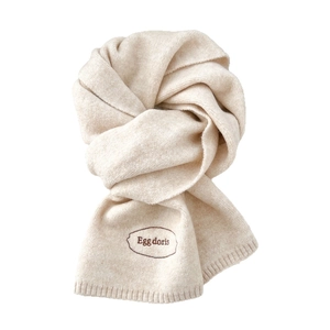 Thick knitted winter scarf in cream white featuring elegant letter embroidery accent