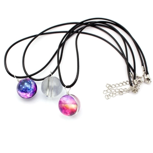 Handmade double-sided galaxy glass ball necklaces with cosmic nebula pendants on black cords
