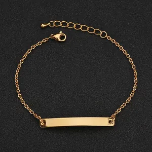 Macro detail of a minimalist rose gold stainless steel curved bar bracelet with adjustable chain