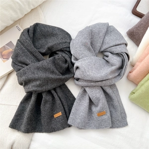Solid color knitted long scarf for women with leather label in gray color tones