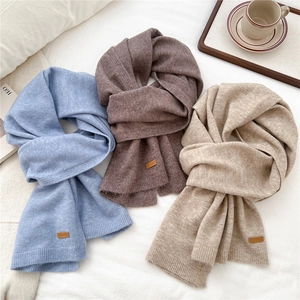 Chic knit scarf set in blue, brown, and beige with leather patch and ribbed edges